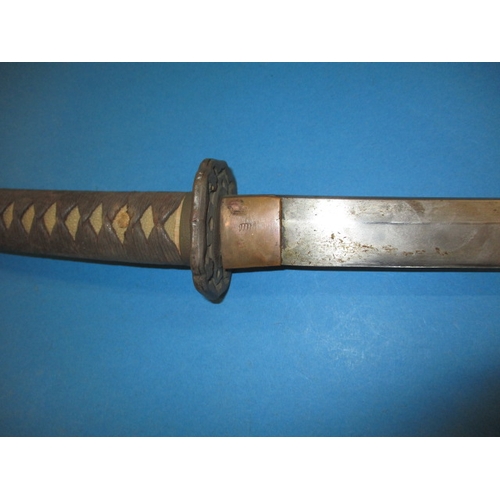 An antique Japanese Katana sword, having inscription to tang, a ...