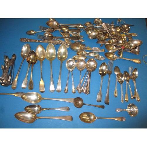 148 - A parcel of antique and later silver flatware, to include a caddy spoon, approx. gross parcel weight... 