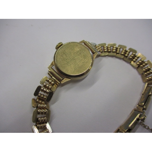 69 - A vintage 9ct gold ladies wrist watch, approx. weight without movement 13.9g, runs when wound with g... 