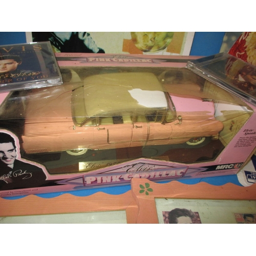 254 - A parcel of Elvis Presley collectables, to include die-cast vehicles and first day covers, all in us... 