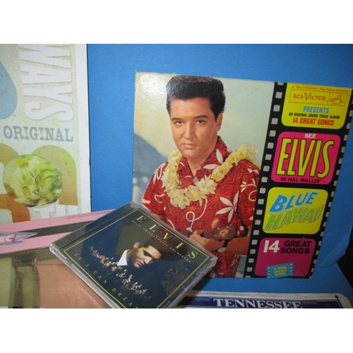 254 - A parcel of Elvis Presley collectables, to include die-cast vehicles and first day covers, all in us... 