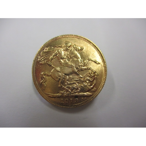 120 - A George V full gold sovereign dated 1913, a circulated coin with good definition of features