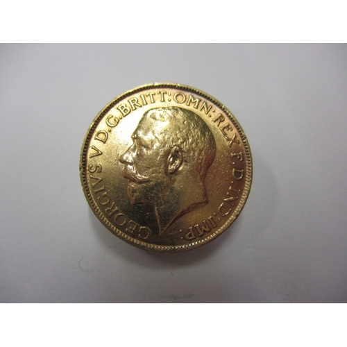 120 - A George V full gold sovereign dated 1913, a circulated coin with good definition of features