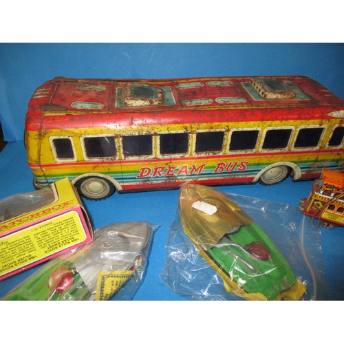 251 - A parcel of vintage toys to include tin-plate and diecast, all in well used condition