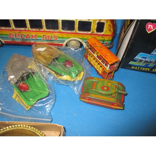 251 - A parcel of vintage toys to include tin-plate and diecast, all in well used condition