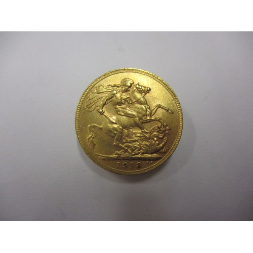 88 - A George V full gold sovereign dated 1913, a circulated coin with good definition of features