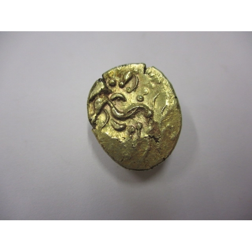 123 - A Celtic gold stater, struck both sides, approx. weight 6.3g, approx. dimensions 21.3mm x  18.2mm an... 