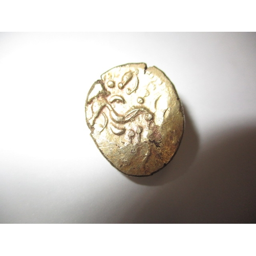 123 - A Celtic gold stater, struck both sides, approx. weight 6.3g, approx. dimensions 21.3mm x  18.2mm an... 