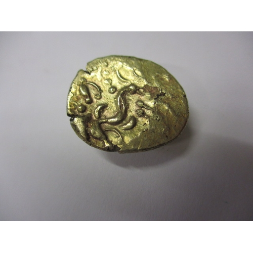 123 - A Celtic gold stater, struck both sides, approx. weight 6.3g, approx. dimensions 21.3mm x  18.2mm an... 