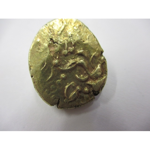 123 - A Celtic gold stater, struck both sides, approx. weight 6.3g, approx. dimensions 21.3mm x  18.2mm an... 