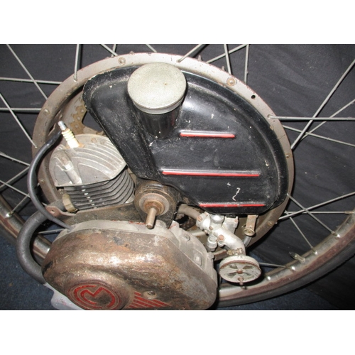 231 - A mid-20th century Cycle Master “Winged Wheel” engine and wheel assembly, having new tyre, believed ... 