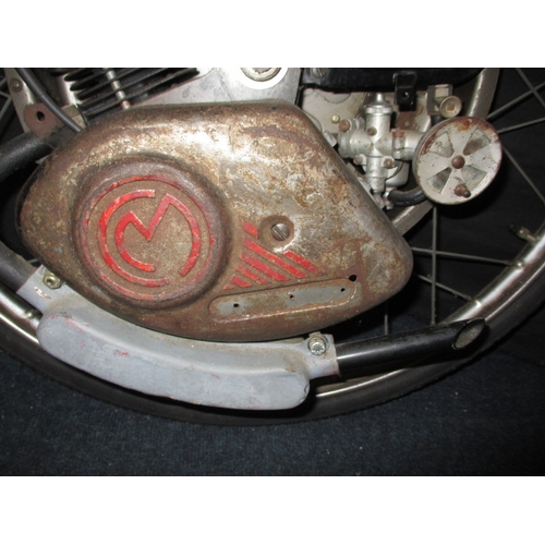 231 - A mid-20th century Cycle Master “Winged Wheel” engine and wheel assembly, having new tyre, believed ... 