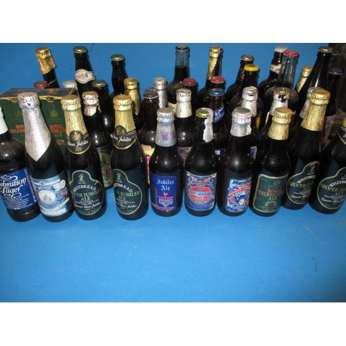 134 - Approx 60 bottles of vintage beer, to include numerous royal commemorative examples, all unopened an... 