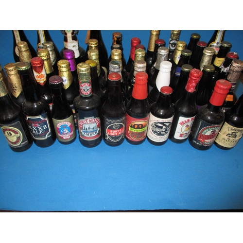 136 - Approx 60 bottles of vintage beer, various makers, all unopened and with contents