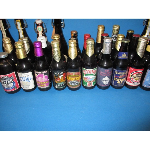 136 - Approx 60 bottles of vintage beer, various makers, all unopened and with contents