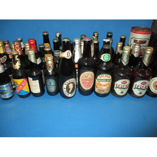 138 - Approx 60 bottles of vintage beer, to include commemorative examples for Olympics and RAF, all unope... 