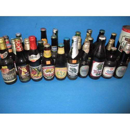 138 - Approx 60 bottles of vintage beer, to include commemorative examples for Olympics and RAF, all unope... 