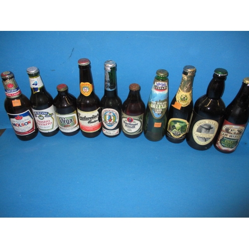 138 - Approx 60 bottles of vintage beer, to include commemorative examples for Olympics and RAF, all unope... 