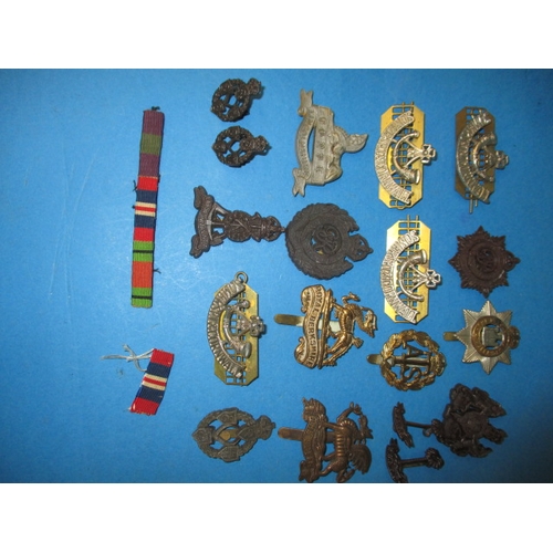 90 - A parcel of WWI & WWII military badges, all in good used condition