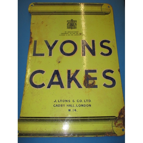 260 - An early 20th century double sided enamel advertising sign for Lyons Cakes, having some fading and m... 