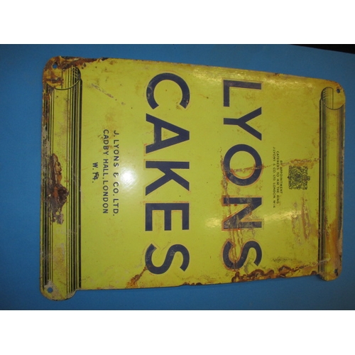 260 - An early 20th century double sided enamel advertising sign for Lyons Cakes, having some fading and m... 