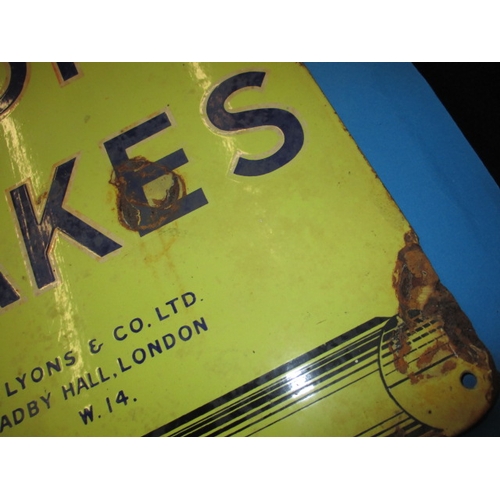 260 - An early 20th century double sided enamel advertising sign for Lyons Cakes, having some fading and m... 