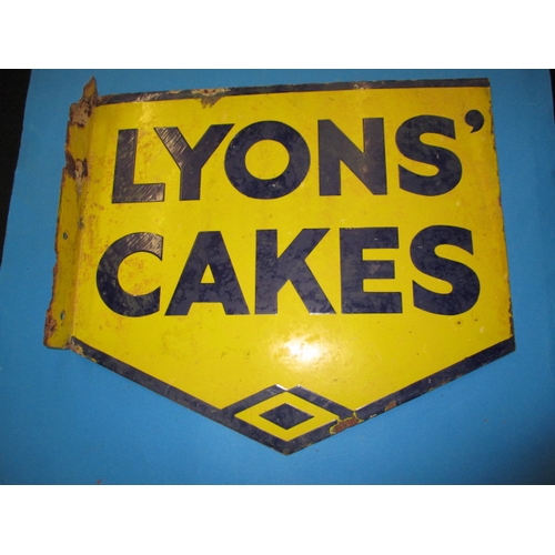 252 - An early 20th century double sided enamel advertising sign for Lyons Cakes, having some light rust a... 