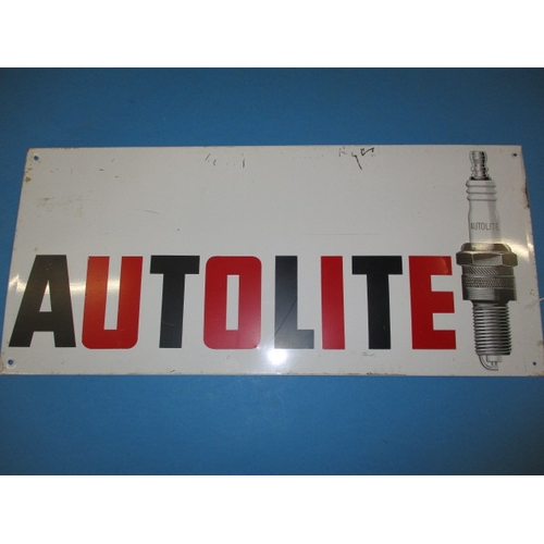 246 - A vintage tin plate Autolite Spark plug advertising sign, approx. size 50x23cm in good useable pre-o... 