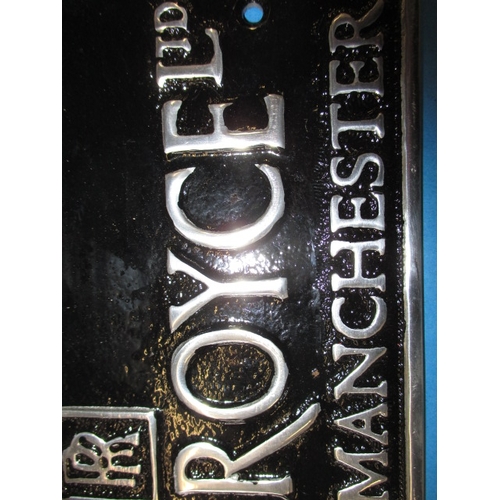 257 - A small cast aluminium advertising plaque for Rolls Royce, approx. size 24.5x10.5cm, in good pre-own... 