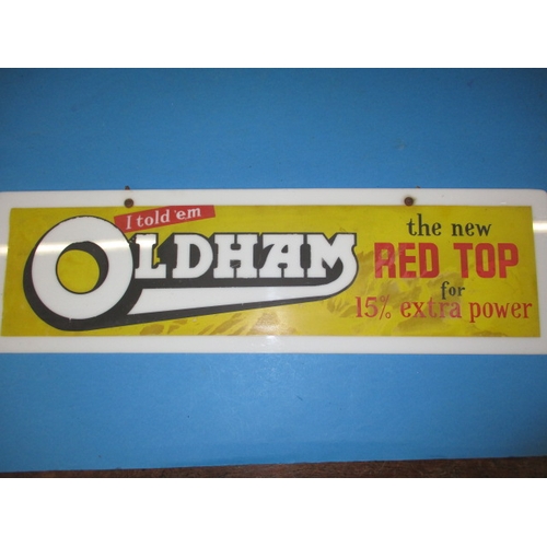 244 - A vintage Perspex advertising sign for Oldham red top vehicle batteries, approx. size 61x17.5cm, in ... 