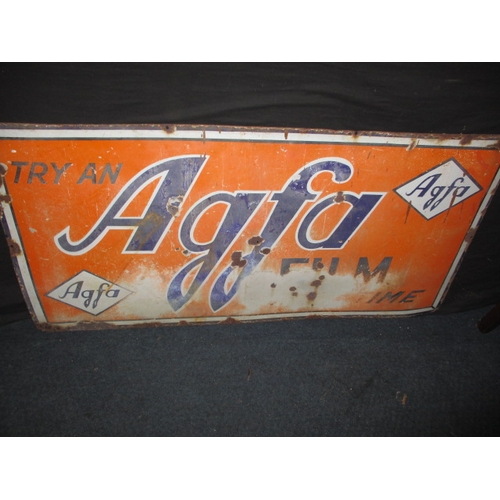 265 - A vintage enamel advertising sign for Agfa films, approx. size 121x61cm, having some fading enamel l... 