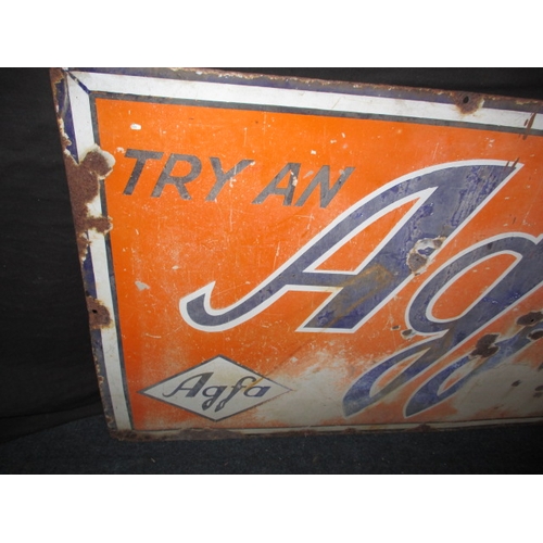 265 - A vintage enamel advertising sign for Agfa films, approx. size 121x61cm, having some fading enamel l... 