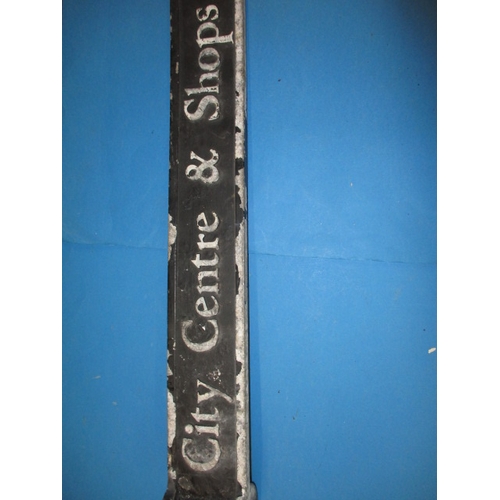 266 - A vintage cast aluminium finger street sign for City centre and shops, slightly bent and cut bracket... 