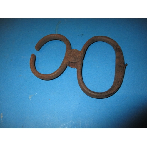 104 - A parcel of antique and later handcuffs, to include a hand to ankle set, most with keys, all with ge... 