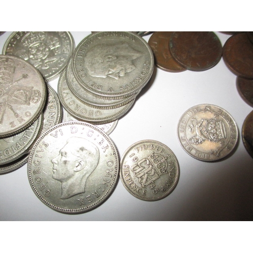 69 - A parcel of vintage coins to include approx. 250g of part silver examples, all in circulated conditi... 