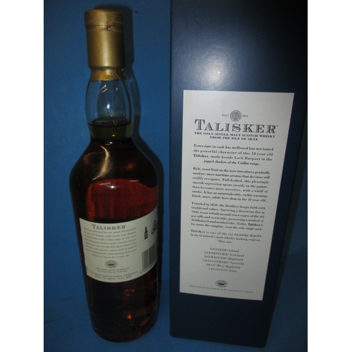 154 - A 70cl bottle of Talisker 18 year old single malt whisky, with original card box, settled mid-neck