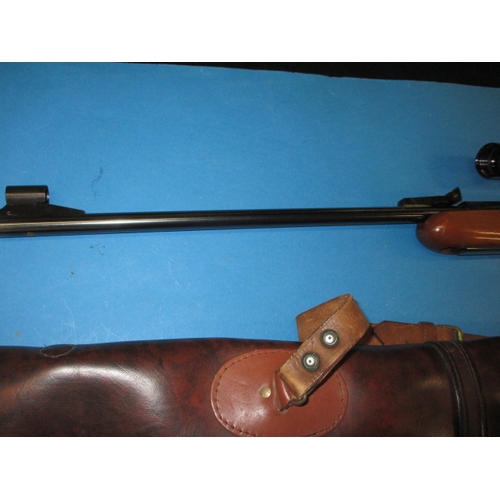 108 - A vintage BSA Airspoter S .177 air rifle, with open sights and Nikko Sterling 6x12 scope, cocks and ... 