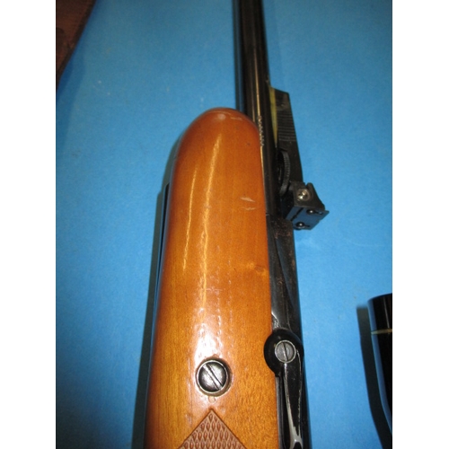 108 - A vintage BSA Airspoter S .177 air rifle, with open sights and Nikko Sterling 6x12 scope, cocks and ... 