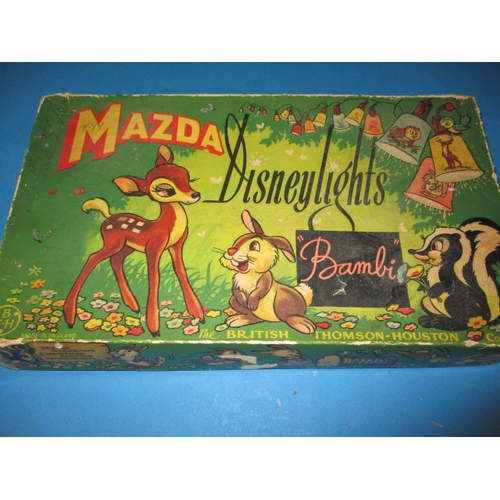 113 - A boxed set of vintage Disney Bambi Christmas tree lights, by Mazda in original display box, some da... 