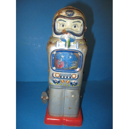 114 - Three vintage tin-plate toys, to include a speed boat and a clockwork robot, the robot runs, all hav... 