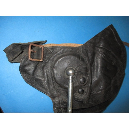 94 - A vintage leather flying helmet made by D Lewis, a Bronze Royal Flying Corps wings badge and some as... 