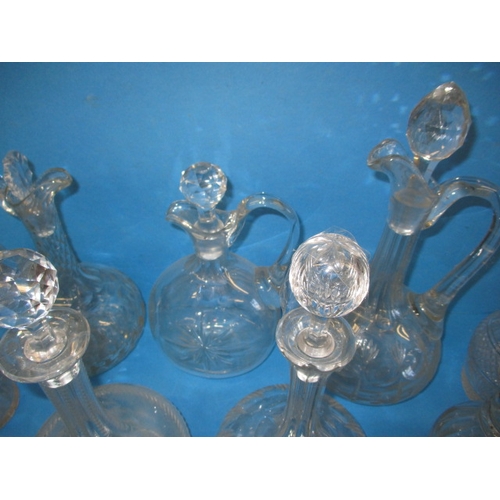 137 - 15 Glass drinks decanters, various sizes and styles to include one matching pair, all in useable pre... 