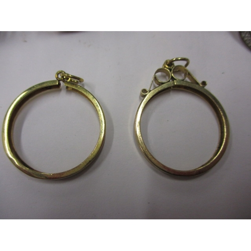 22 - A parcel of 9ct gold coin ring shanks and pendants, all devoid of coins, approx. gross parcel weight... 