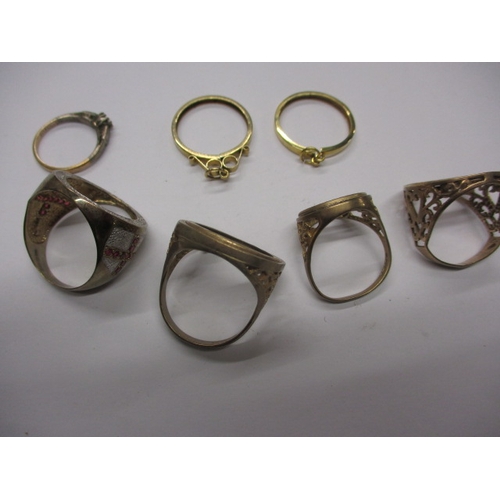 22 - A parcel of 9ct gold coin ring shanks and pendants, all devoid of coins, approx. gross parcel weight... 