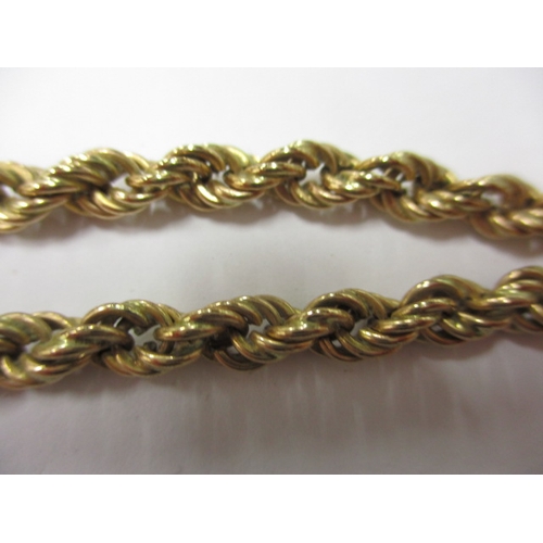 23 - A matching 9ct gold rope necklace and bracelet, approx. linear lengths 18cm and 39cm, both with work... 