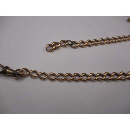 24 - A vintage yellow metal albert chain, T bar marked 9ct, approx. weight 30.8g in used condition
