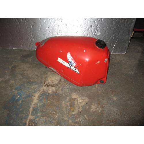 223 - A Honda motorcycle petrol tank. Sold as restoration project, age related marks