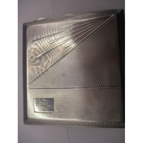 80 - A 1930s sterling silver art deco cigarette case, approx. weight 121.7g having initials to top right ... 