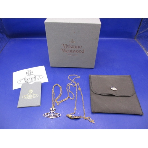 74 - A vintage Vivienne Westwood necklace in original box with pouch and paperwork