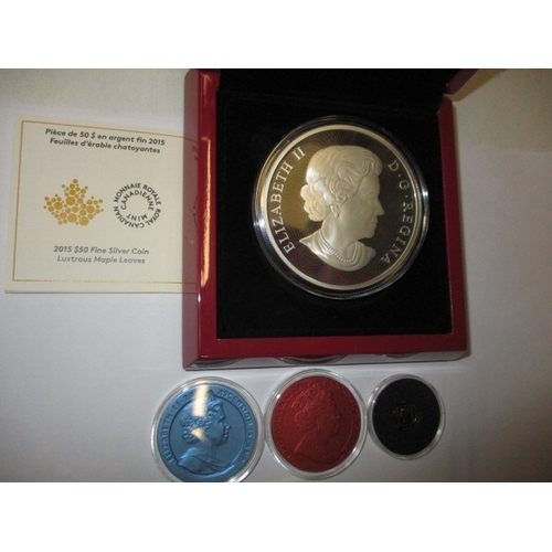 66 - A 2015 Canadian $50 fine silver coin and 3 proof silver stamp coins, all in plastic protection capsu... 